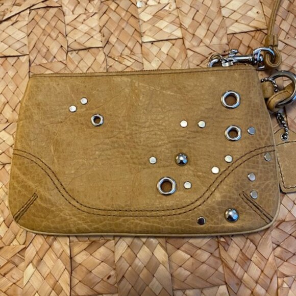 Coach tan pebbled leather grommet studded wristlet (authenticated) - Picture 1 of 4